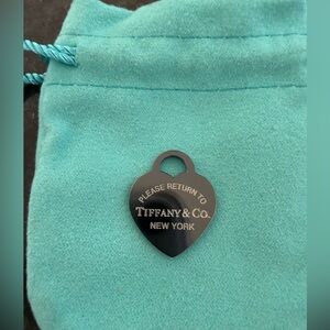 Authentic Tiffany & Co heart charm, titanium and 925 Sterling